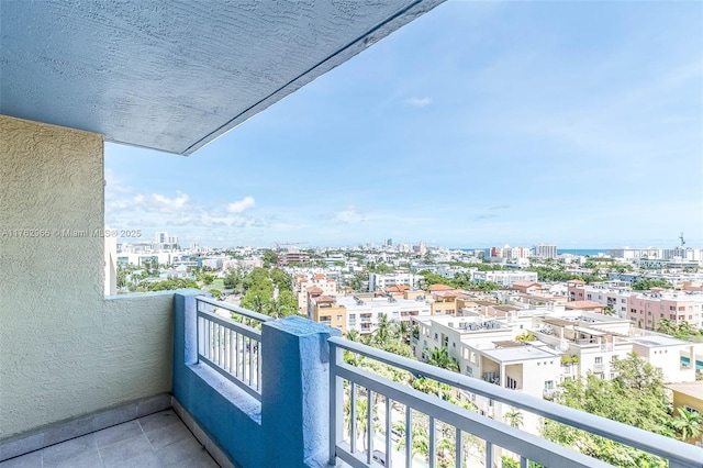 balcony featuring a city view