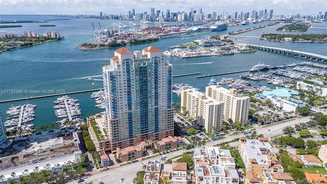 aerial view featuring a water view and a city view