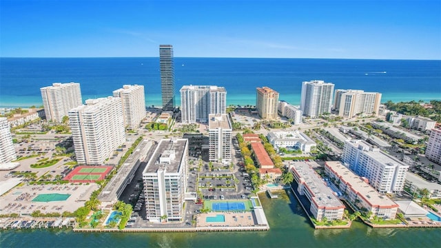 bird's eye view featuring a water view and a city view