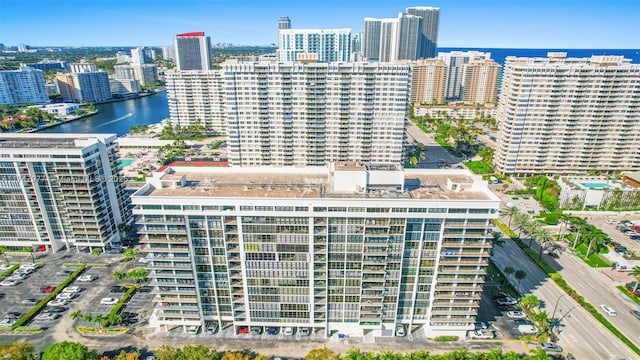 drone / aerial view with a water view and a view of city