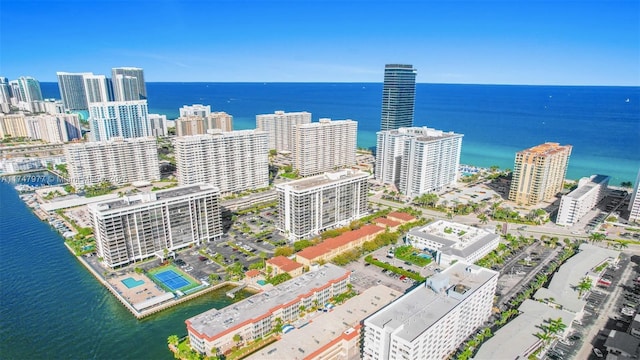 aerial view with a city view and a water view