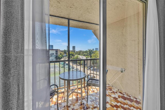 balcony featuring a view of city