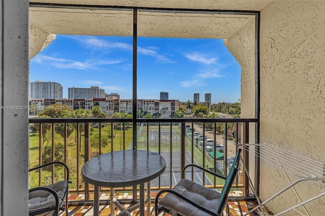 balcony featuring a city view