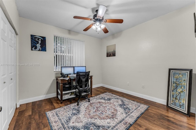 home office featuring ceiling fan, baseboards, and wood finished floors