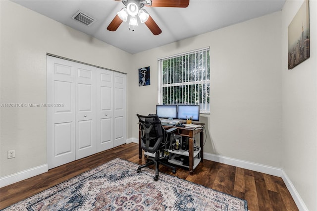 office with wood finished floors, visible vents, and baseboards