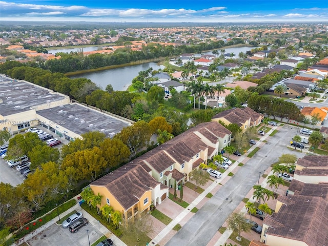 aerial view with a water view and a residential view