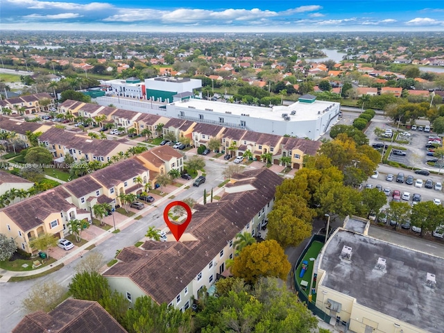 birds eye view of property with a residential view