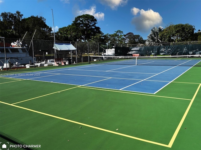 view of sport court with community basketball court and fence