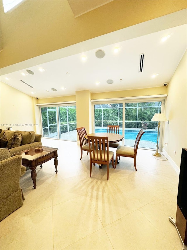 dining room with recessed lighting, visible vents, and baseboards