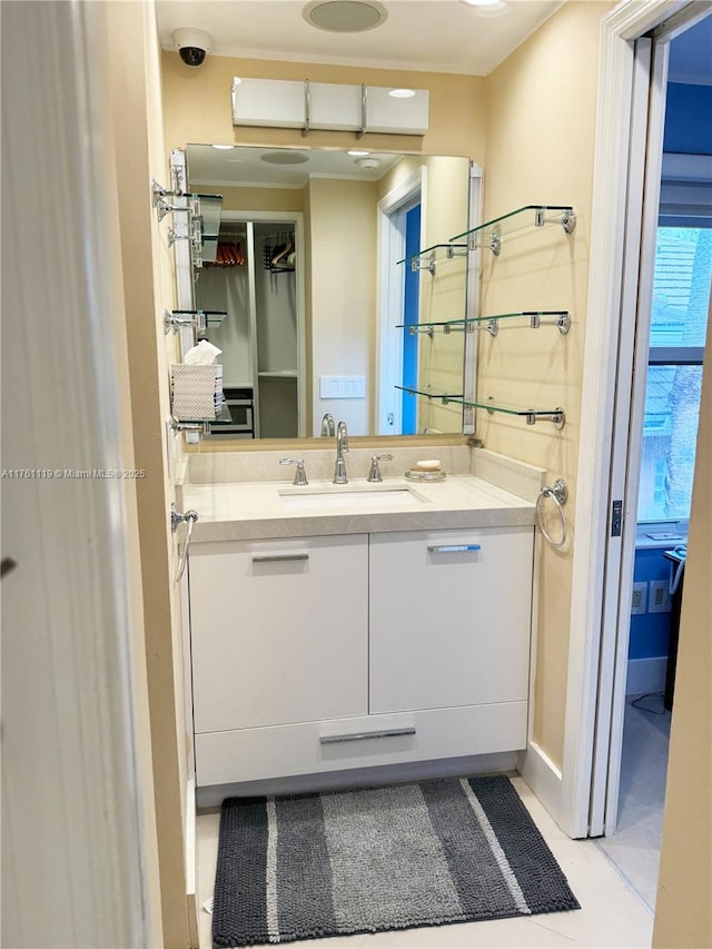 bathroom featuring vanity and tile patterned flooring