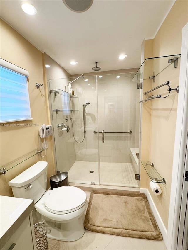 full bathroom with tile patterned floors, toilet, a stall shower, recessed lighting, and vanity