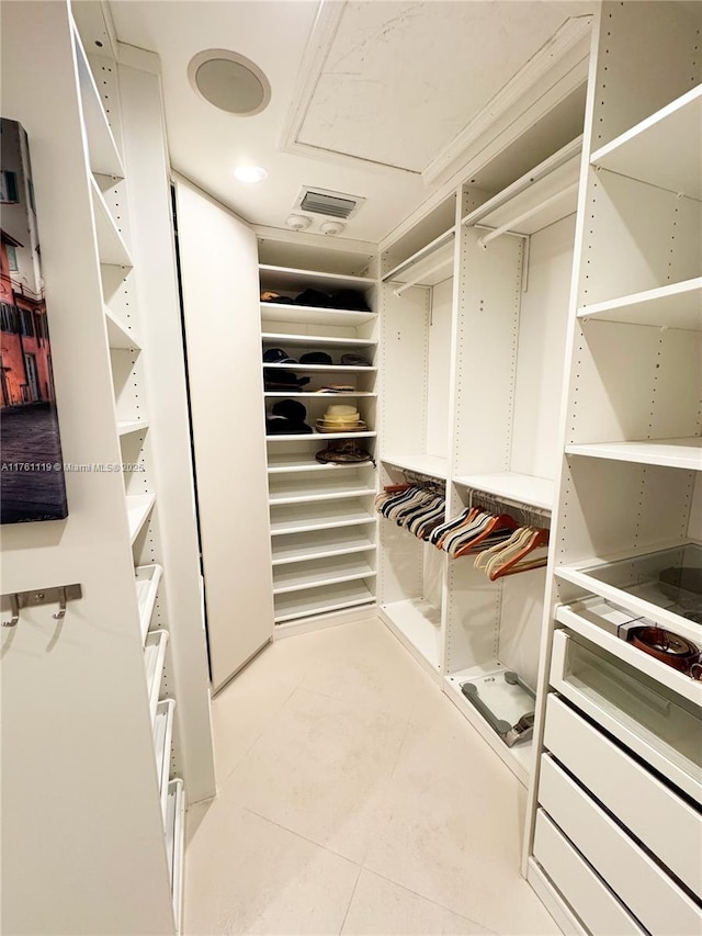 walk in closet with tile patterned flooring and visible vents