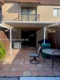 view of patio / terrace with a balcony