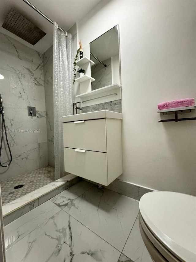 full bathroom with vanity, toilet, marble finish floor, and a marble finish shower