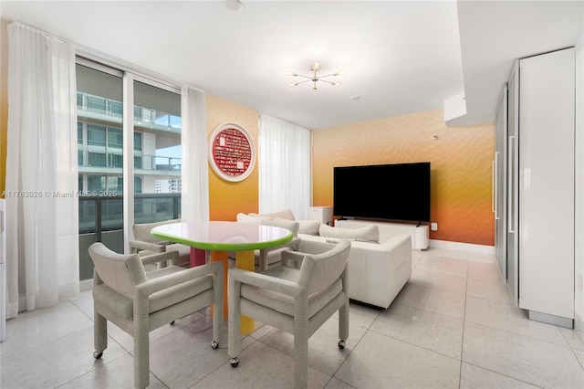 living area with baseboards, light tile patterned flooring, and wallpapered walls