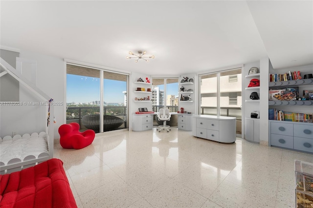 living area with floor to ceiling windows