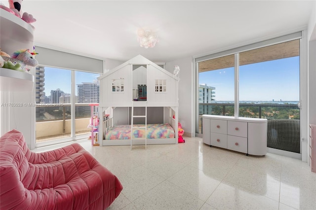 bedroom with a view of city