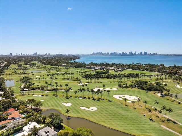 aerial view featuring view of golf course and a water view