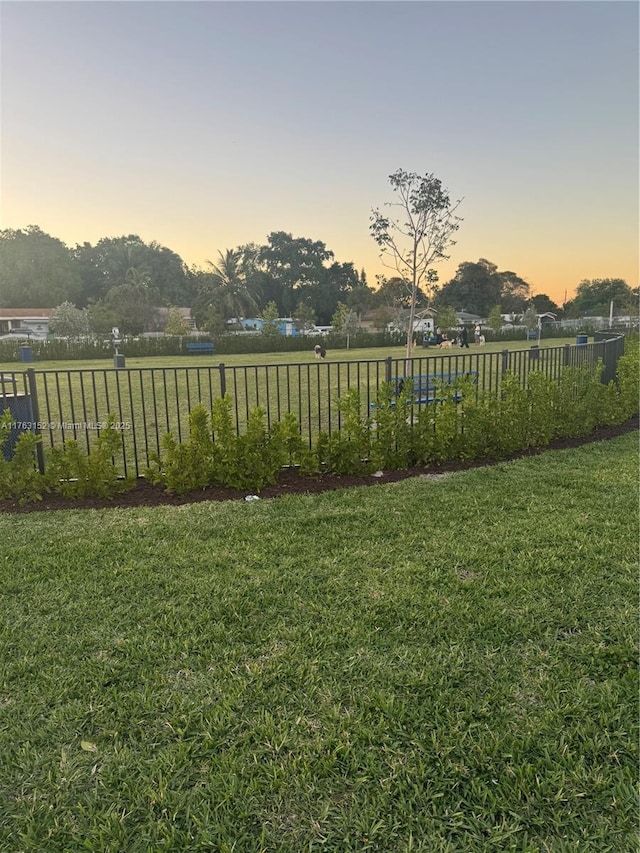 yard at dusk with fence