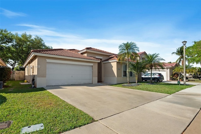 view of front of home featuring an attached garage, a front lawn, a tiled roof, stucco siding, and driveway