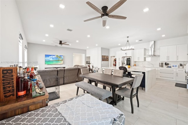 dining area featuring recessed lighting and a ceiling fan