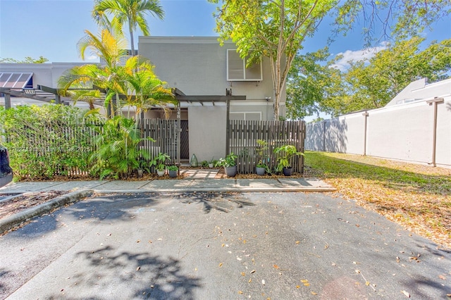 1548 NW 113th Way, Pembroke Pines, FL 33026 - exterior space with a fenced front yard
