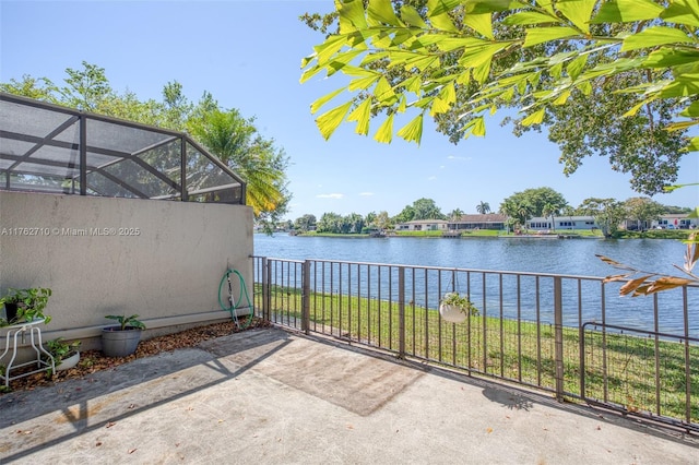 1548 NW 113th Way, Pembroke Pines, FL 33026 - view of patio featuring glass enclosure and a water view