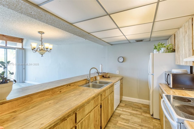 1548 NW 113th Way, Pembroke Pines, FL 33026 - unfurnished living room featuring stairway, wood finished floors, ceiling fan with notable chandelier, baseboards, and visible vents