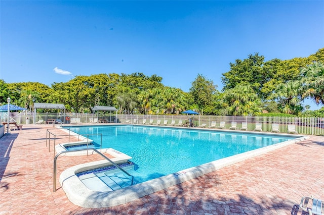 1548 NW 113th Way, Pembroke Pines, FL 33026 - pool featuring a patio area and fence