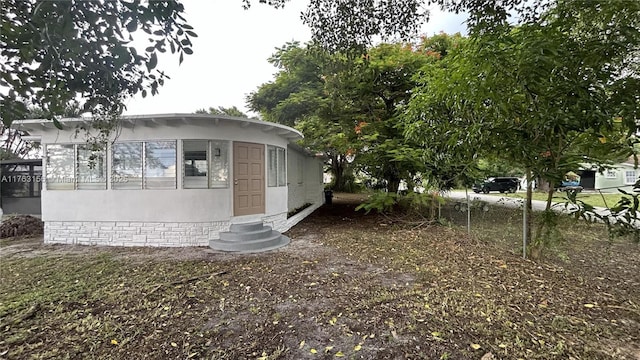 view of front of home with entry steps