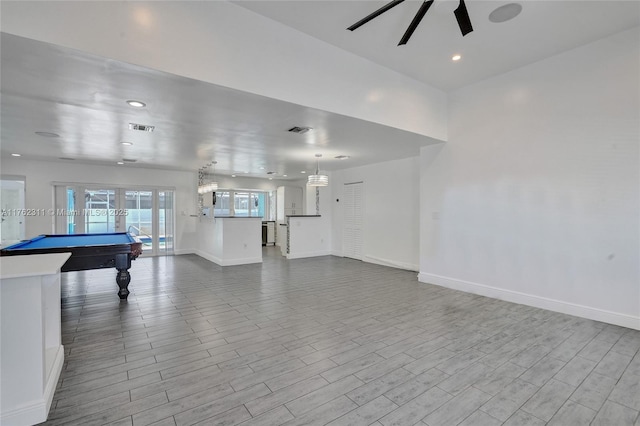 playroom with visible vents, baseboards, and dark wood-style flooring