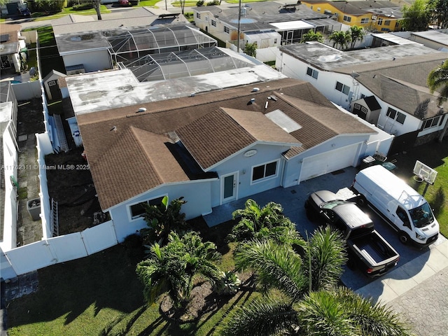 birds eye view of property with a residential view