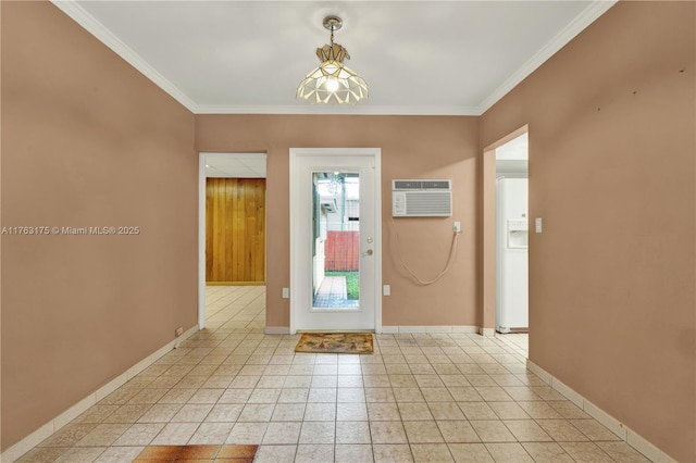 entrance foyer featuring a wall unit AC, light tile patterned floors, crown molding, and baseboards