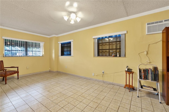 sitting room with crown molding, a wall mounted air conditioner, light tile patterned floors, a textured ceiling, and a ceiling fan