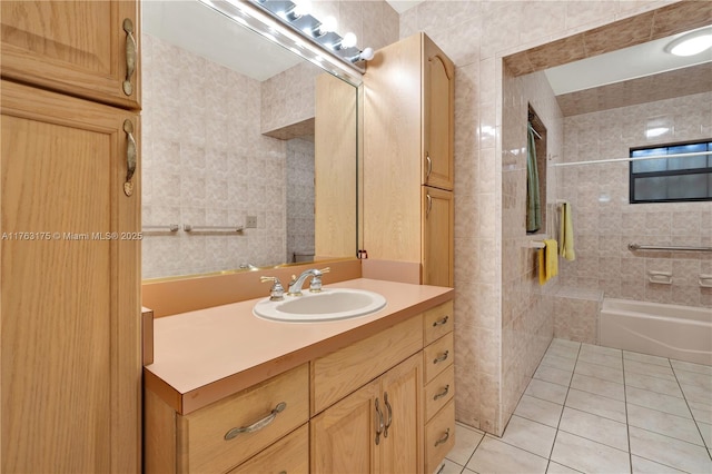 full bathroom featuring tile patterned floors and vanity