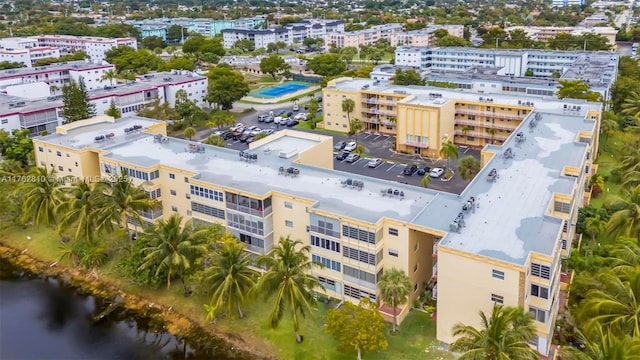 birds eye view of property with a view of city