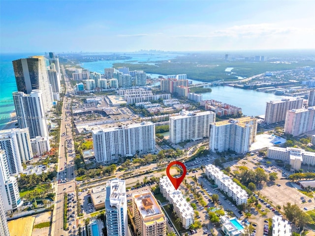 bird's eye view featuring a city view and a water view