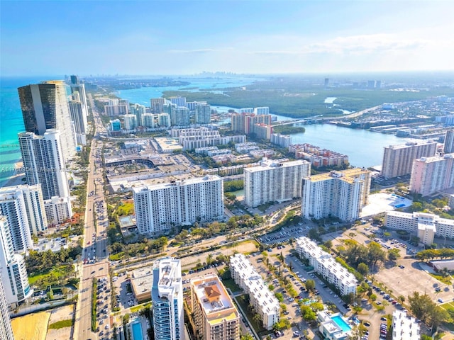 aerial view with a city view and a water view