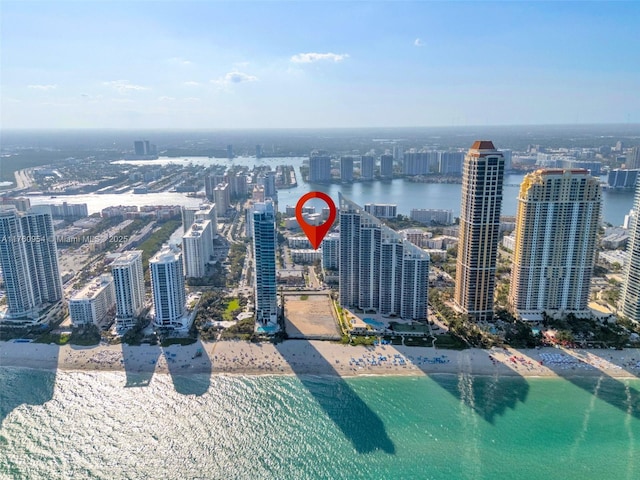 bird's eye view featuring a view of city and a water view