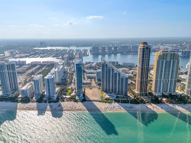 aerial view with a city view and a water view