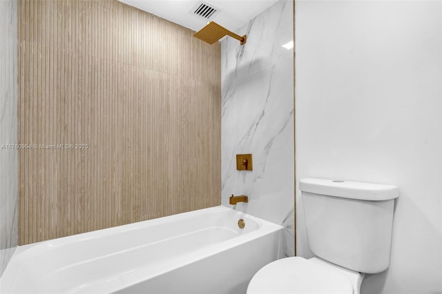 full bathroom featuring toilet and visible vents