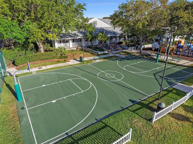 view of sport court featuring community basketball court and fence