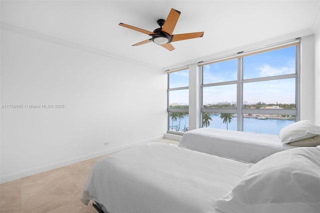 bedroom featuring a wall of windows, crown molding, baseboards, and ceiling fan