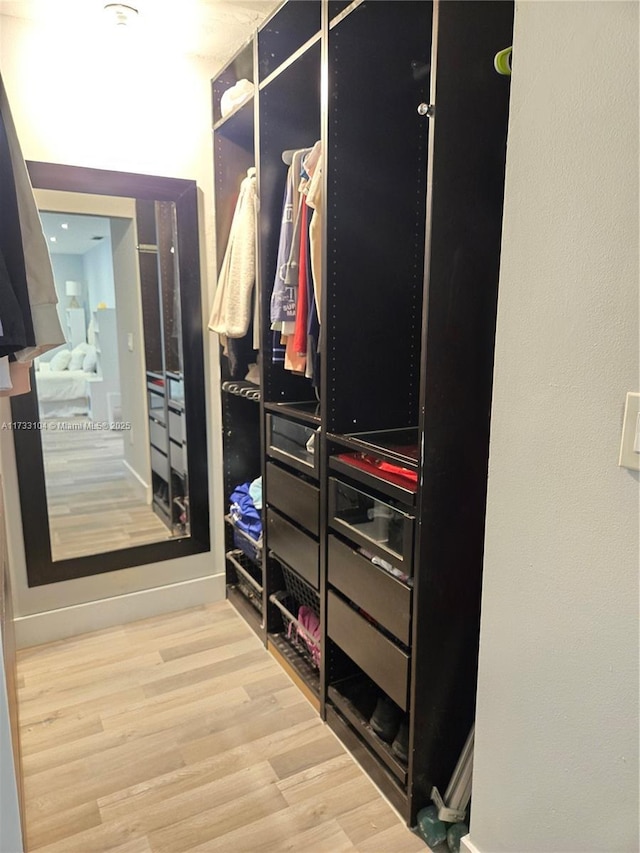 mudroom featuring wood finished floors