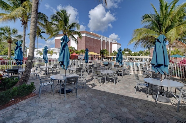 view of patio featuring fence