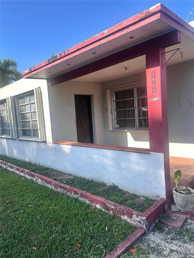 exterior space featuring stucco siding