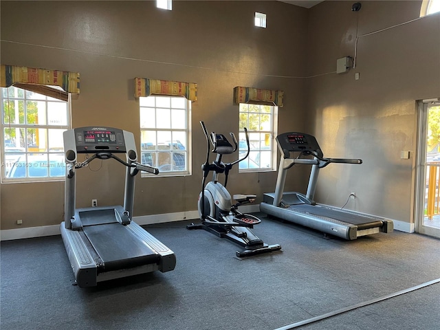 workout room with baseboards