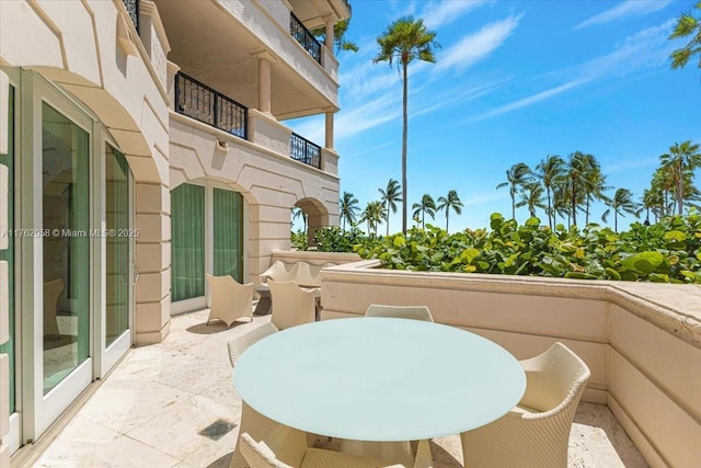 balcony featuring outdoor dining area