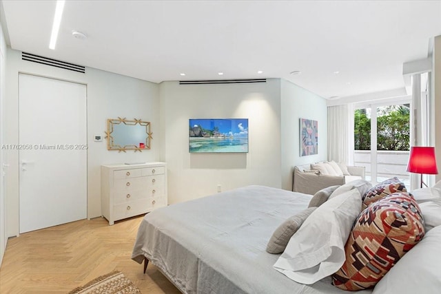 bedroom with recessed lighting and visible vents