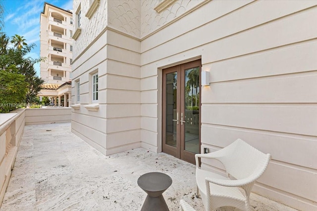 entrance to property featuring french doors